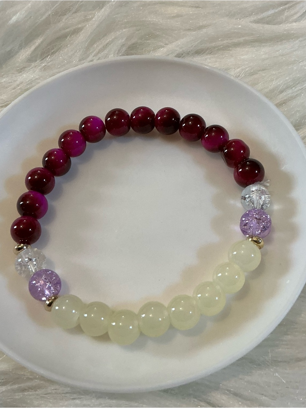 Pretty purple/pink-ish clear bead bracelet